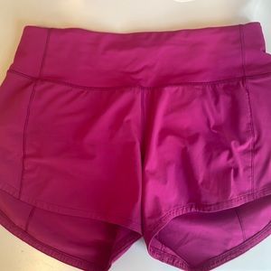 Lululemon size 4, 4 inch speed up shorts - raspberry. Brand new.